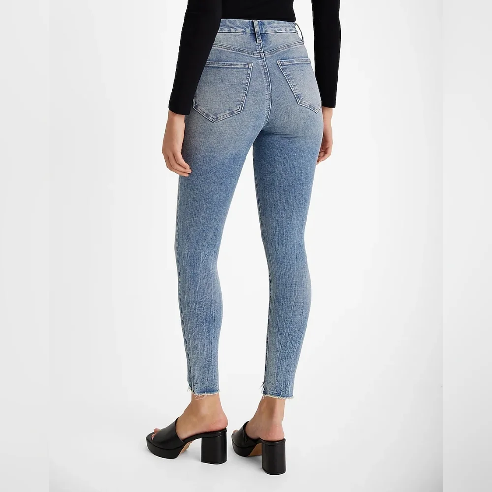 Express High Waisted Medium Wash Raw Hem FlexX Skinny Jeans - Picture 3 of 6